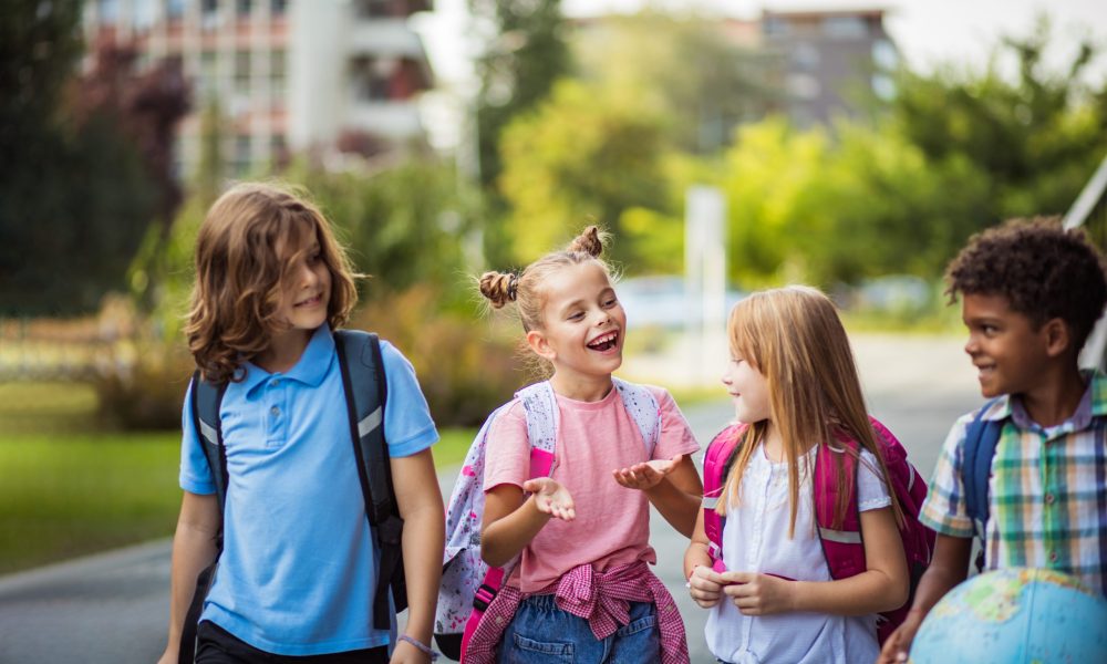 School kids going to school together.